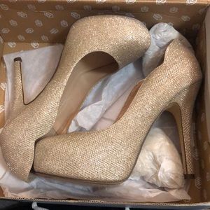 Gold high heels